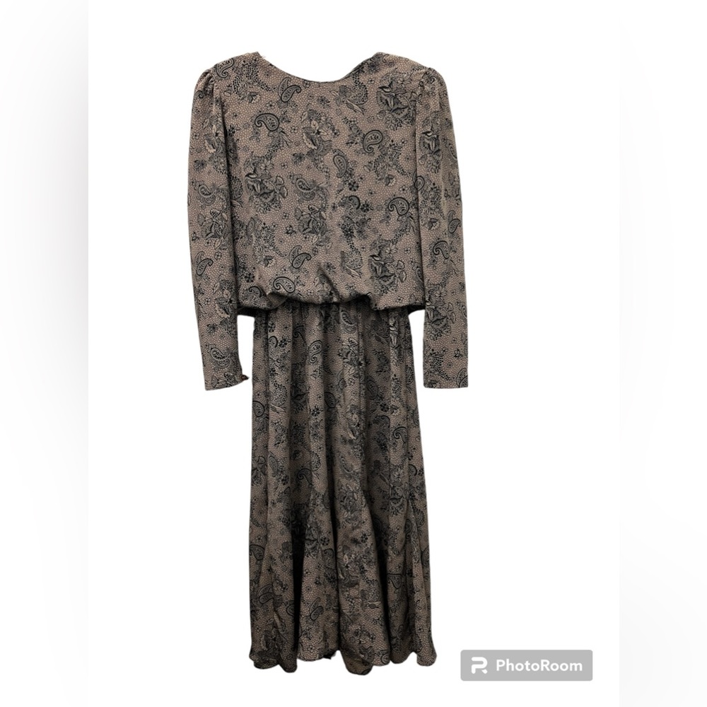 Worn once , feels rich and silky- classy look perfect to accessorize in!